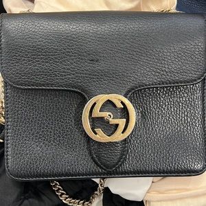 Black gucci leather bag used.